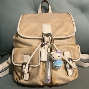 Coach Creme Nylon Double Pocket Drawstring Women's Backpack Sanrio Bag Charm